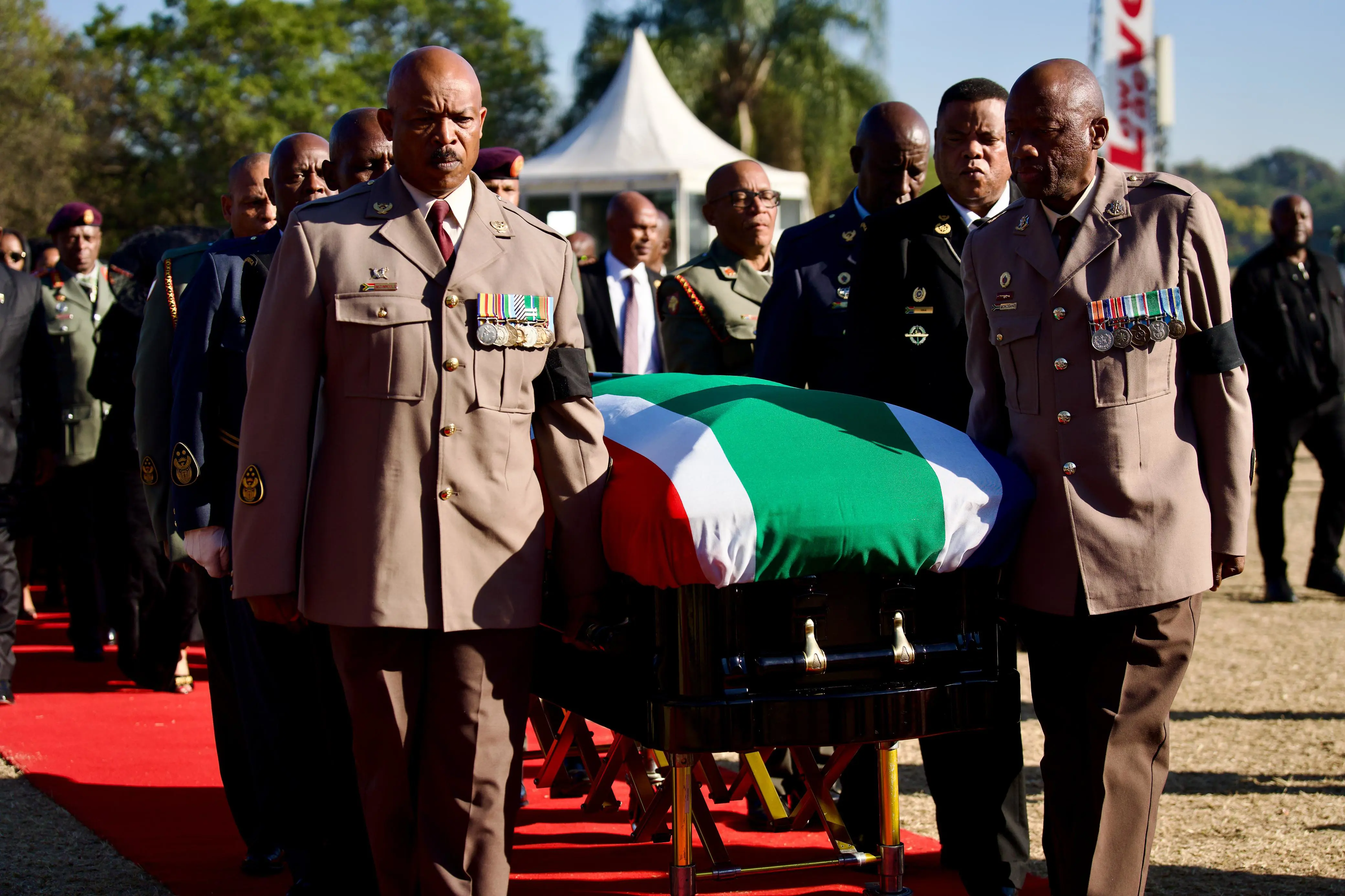 A military guard escorts the body of former Deputy President David Mabuza to the funeral service at the Hoërskool Bergvlam in Mbombela, Mpumalanga on 12 July 2025. Picture: Katlego Jiyane/EWN A military guard escorts the body of former Deputy President David Mabuza to the funeral service at the Hoërskool Bergvlam in Mbombela, Mpumalanga on 12 July 2025. Picture: Katlego Jiyane/EWN