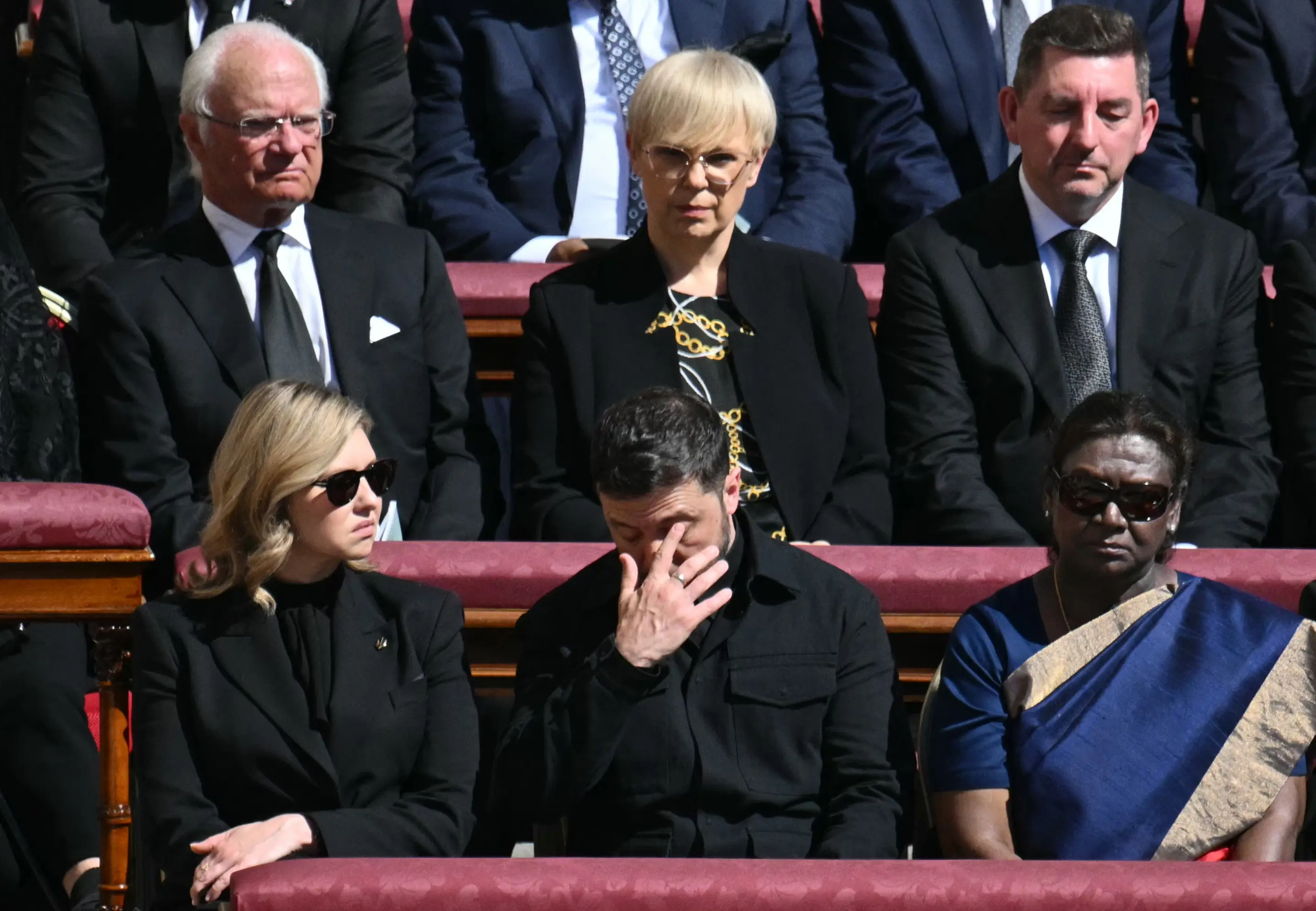 Ukraine's President Volodymyr Zelensky (C) and his wife Olena Zelenska (L) sit alongside other leaders including India's President Droupadi Murmu (R) as they attend the late Pope Francis' funeral ceremony at St Peter's Square at the Vatican on 26 April 2025. Picture: AFP Ukraine's President Volodymyr Zelensky (C) and his wife Olena Zelenska (L) sit alongside other leaders including India's President Droupadi Murmu (R) as they attend the late Pope Francis' funeral ceremony at St Peter's Square at the Vatican on 26 April 2025. Picture: AFP