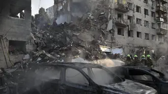 Russian strikes kill 14 in 'horrific' attack on Kyiv Russian strikes kill 14 in 'horrific' attack on Kyiv