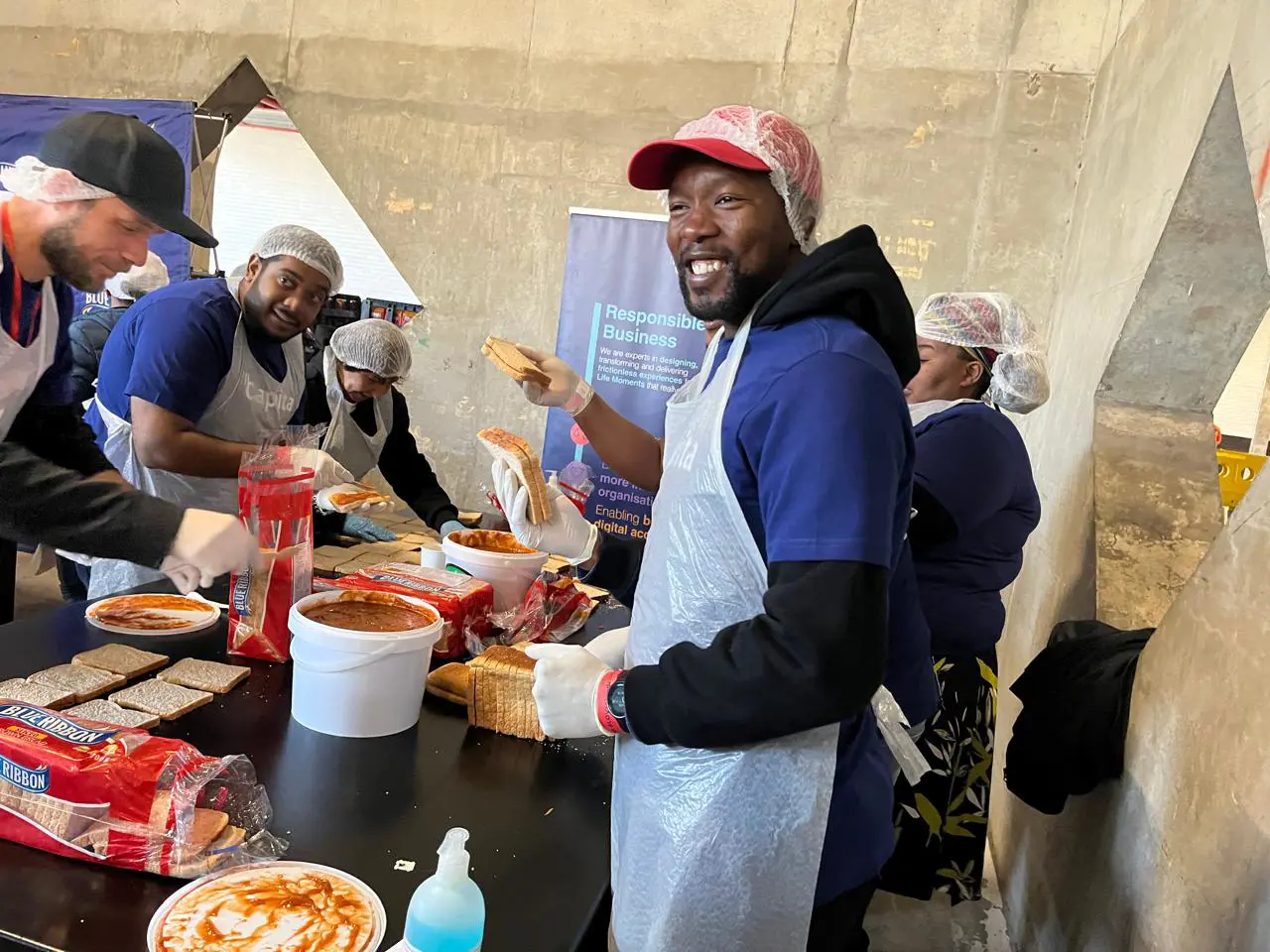Volunteers made sandwiches during the Ladles of Love Mandela Day event at the DHL Stadium in Cape Town on 18 July 2025. Picture: Lauren Isaacs/EWN Volunteers made sandwiches during the Ladles of Love Mandela Day event at the DHL Stadium in Cape Town on 18 July 2025. Picture: Lauren Isaacs/EWN