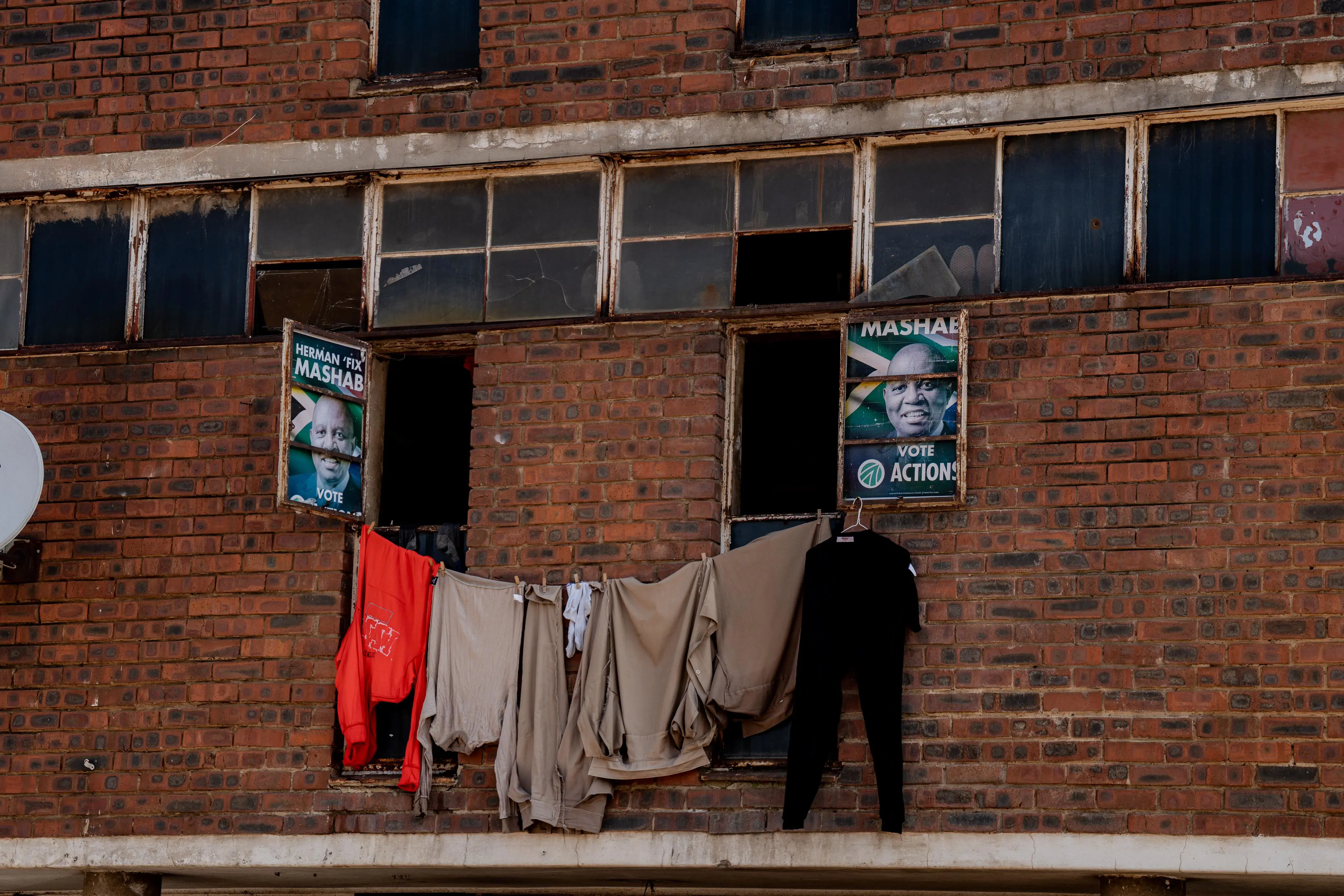 A room window patched with a political party board that reads "Herman 'Fix' Mashaba". Photo: Sphamandla Dlamini/EWN A room window patched with a political party board that reads "Herman 'Fix' Mashaba". Photo: Sphamandla Dlamini/EWN